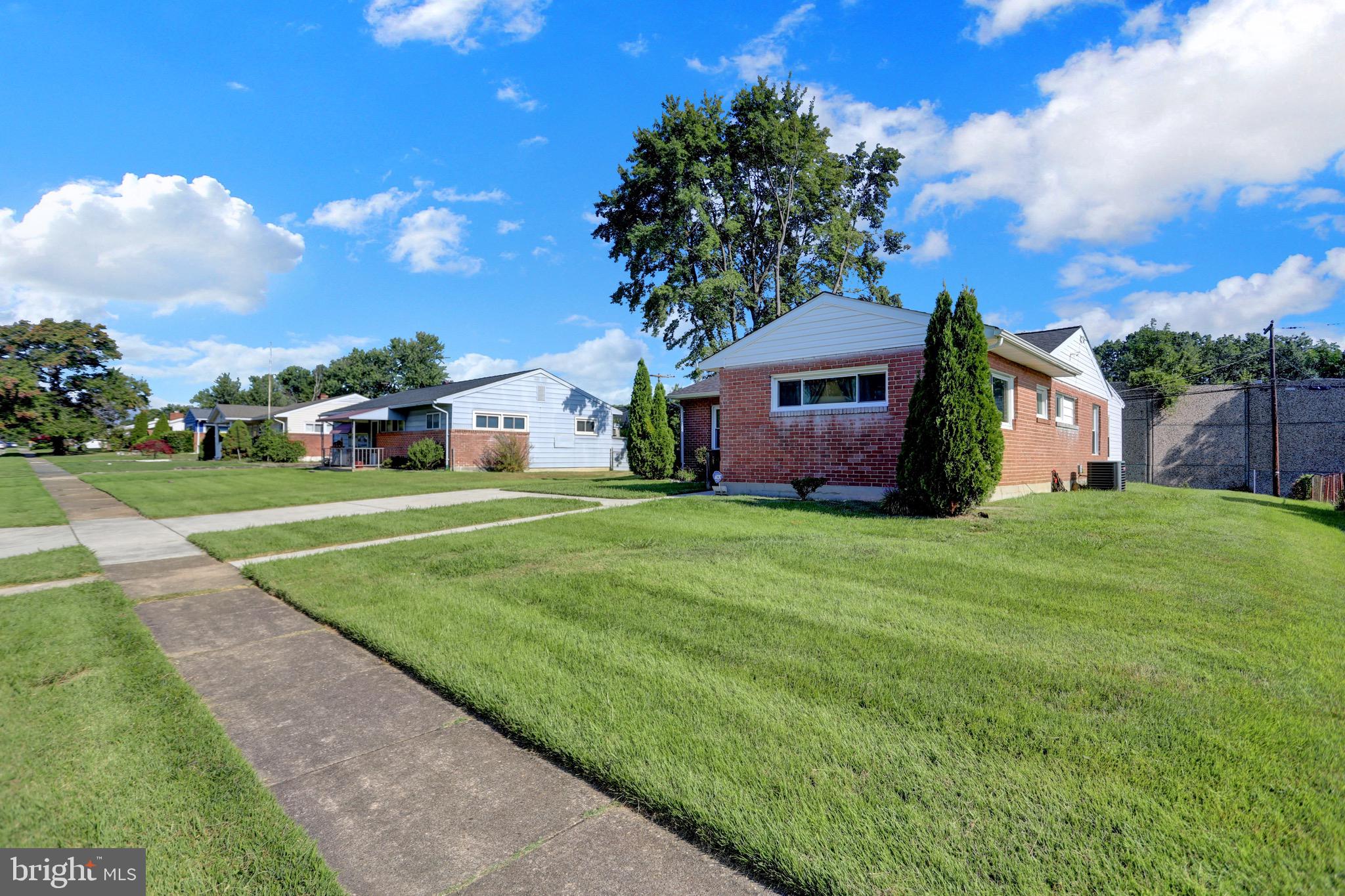 2608 Burridge Road Parkville, MD 21234 - Photo 9 of 15 a front view of house with yard and green space