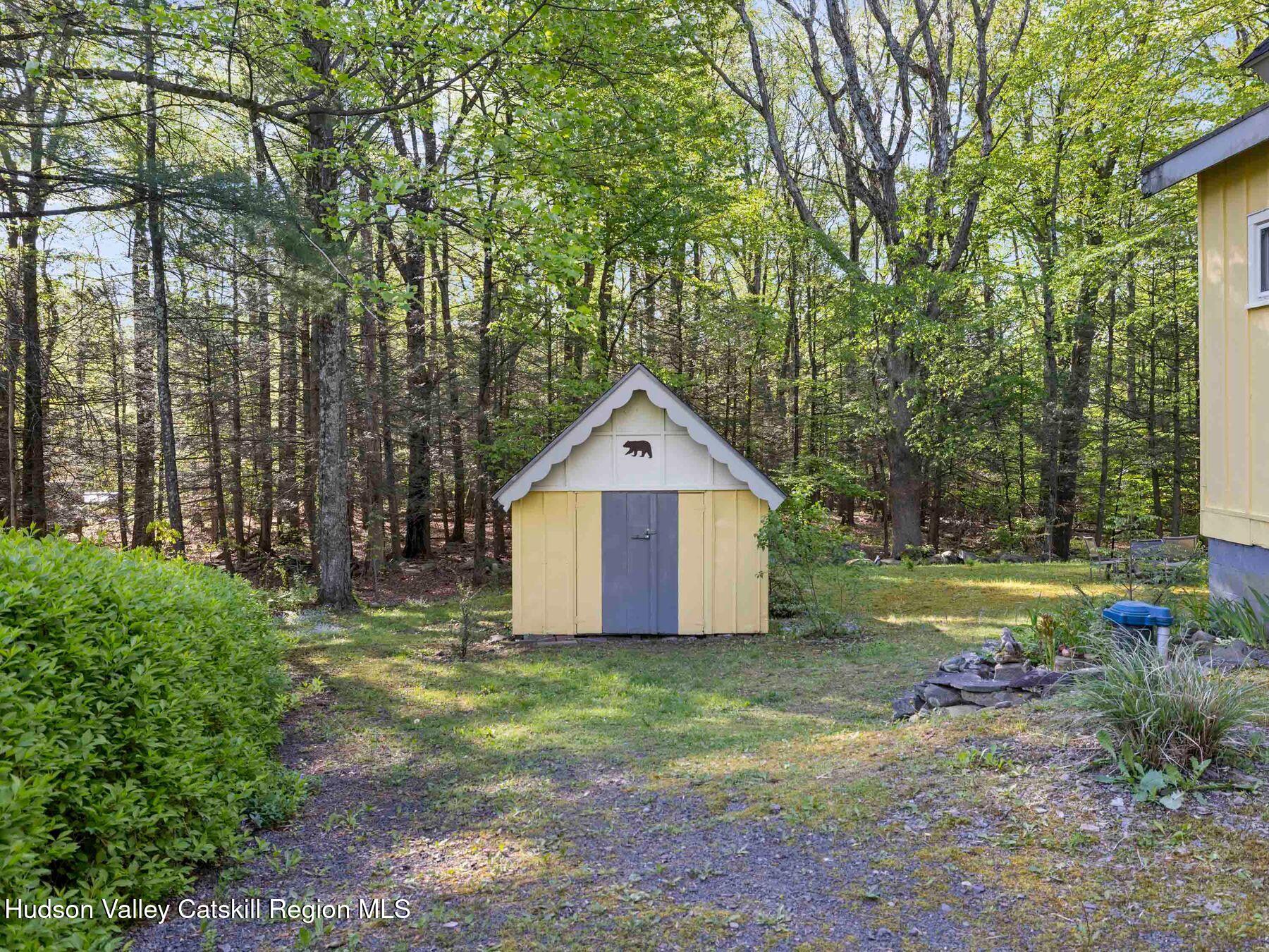 32 Ridge Road Shokan, NY 12481 - Photo 30 of 32 a front view of a house with garden