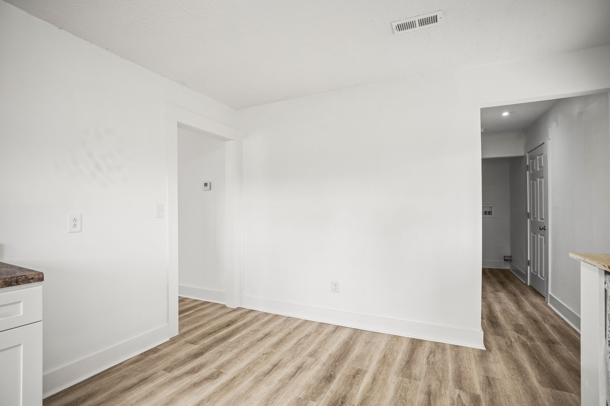 7230 Highway 49 E Springfield Tn 37172 East Springfield, TN 37172 - Photo 14 of 33 a view of a room with wooden floor