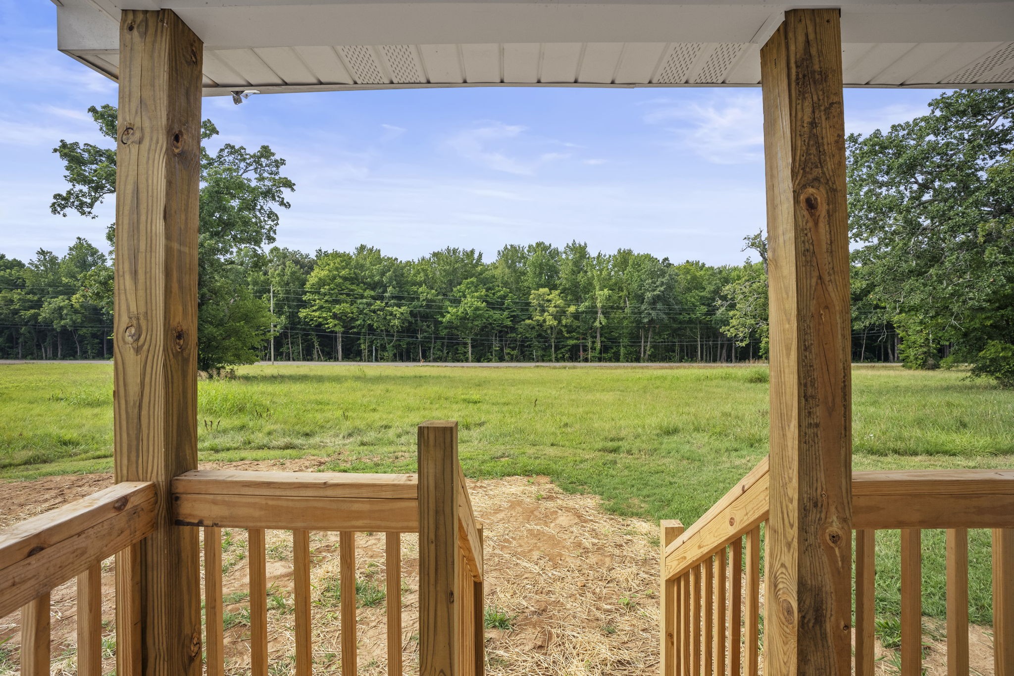 7230 Highway 49 E Springfield Tn 37172 East Springfield, TN 37172 - Photo 2 of 33 a view of a garden from a balcony