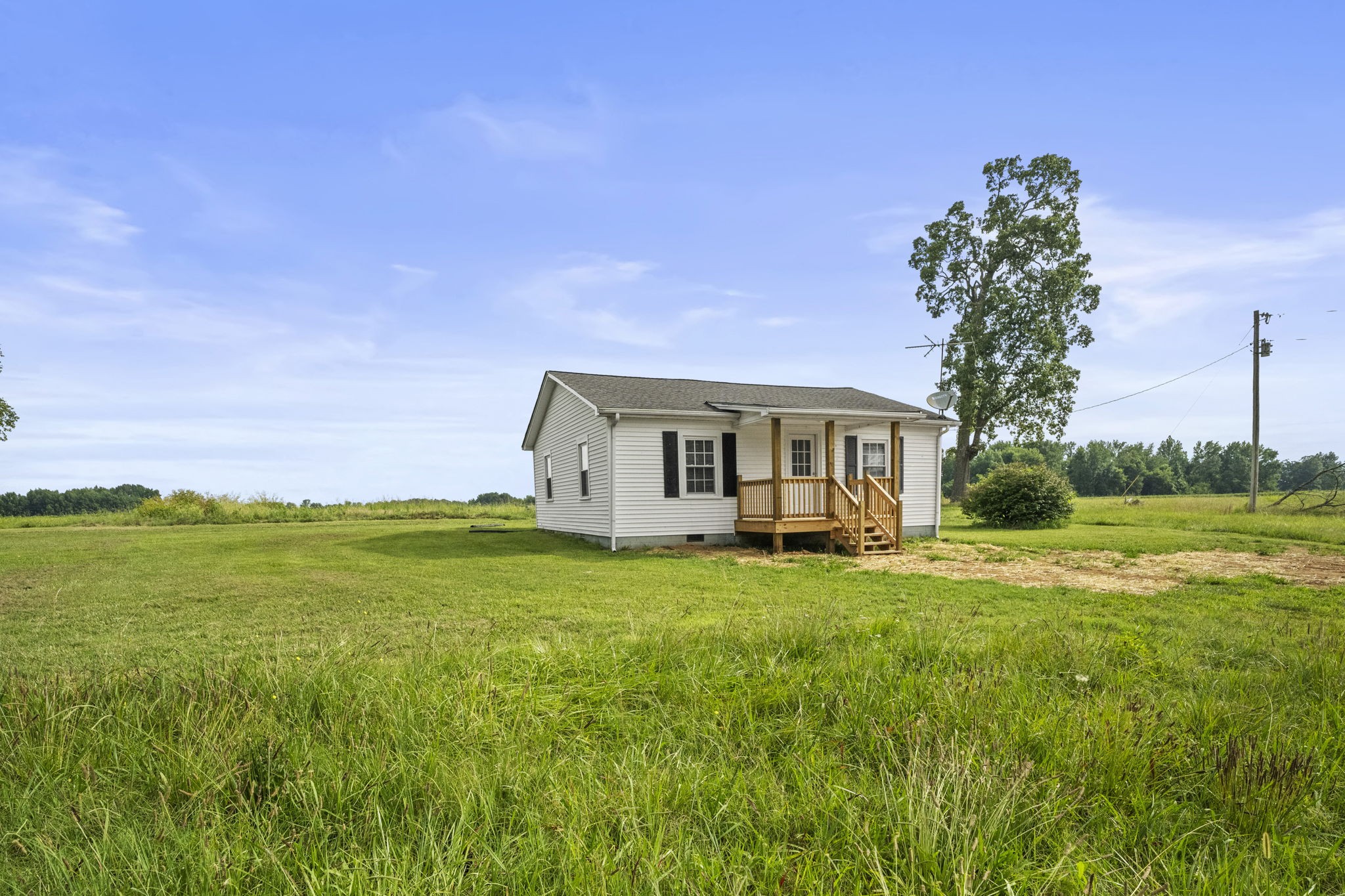 7230 Highway 49 E Springfield Tn 37172 East Springfield, TN 37172 - Photo 26 of 33 a front view of a house with garden