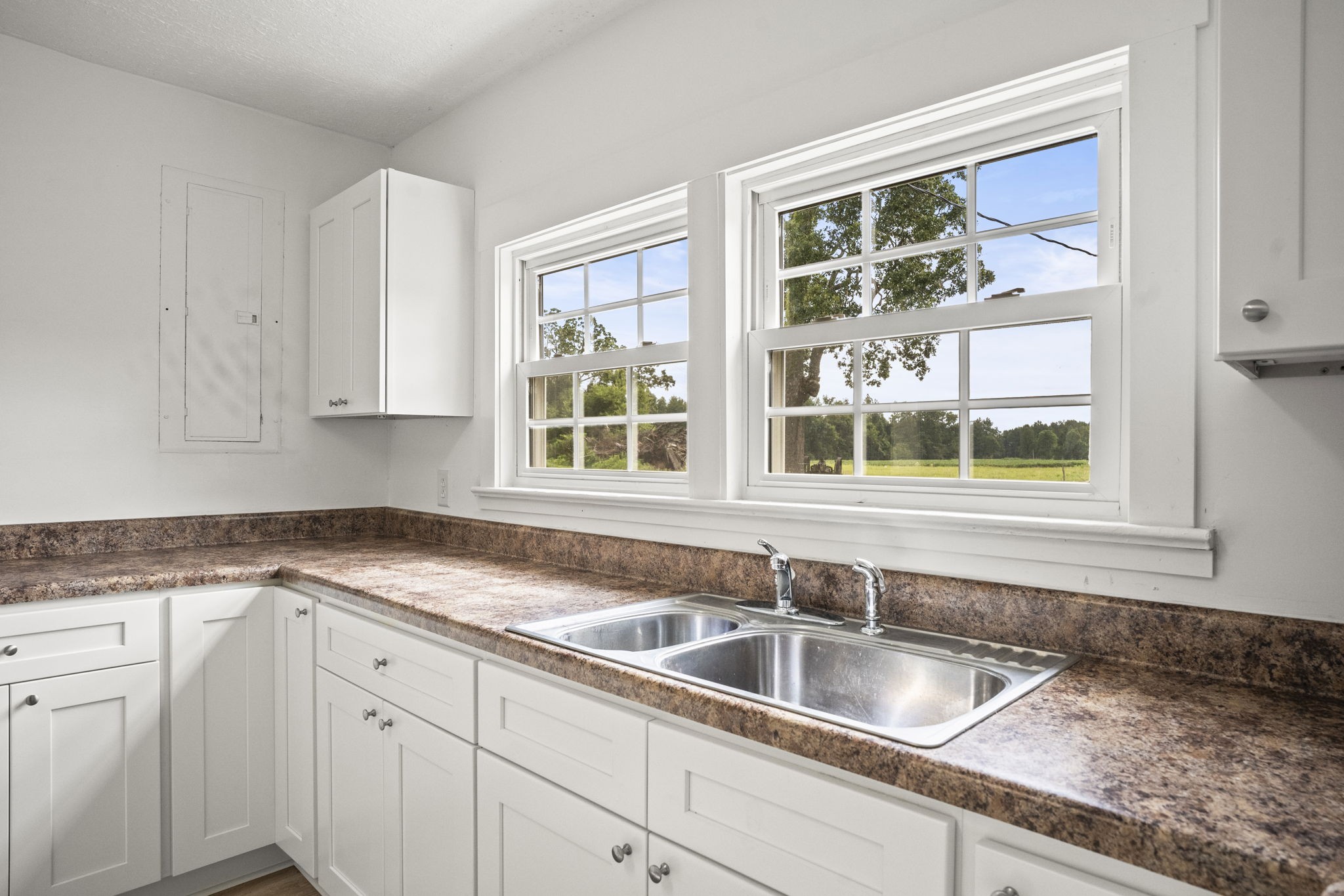 7230 Highway 49 E Springfield Tn 37172 East Springfield, TN 37172 - Photo 5 of 33 a kitchen with granite countertop a sink and a window