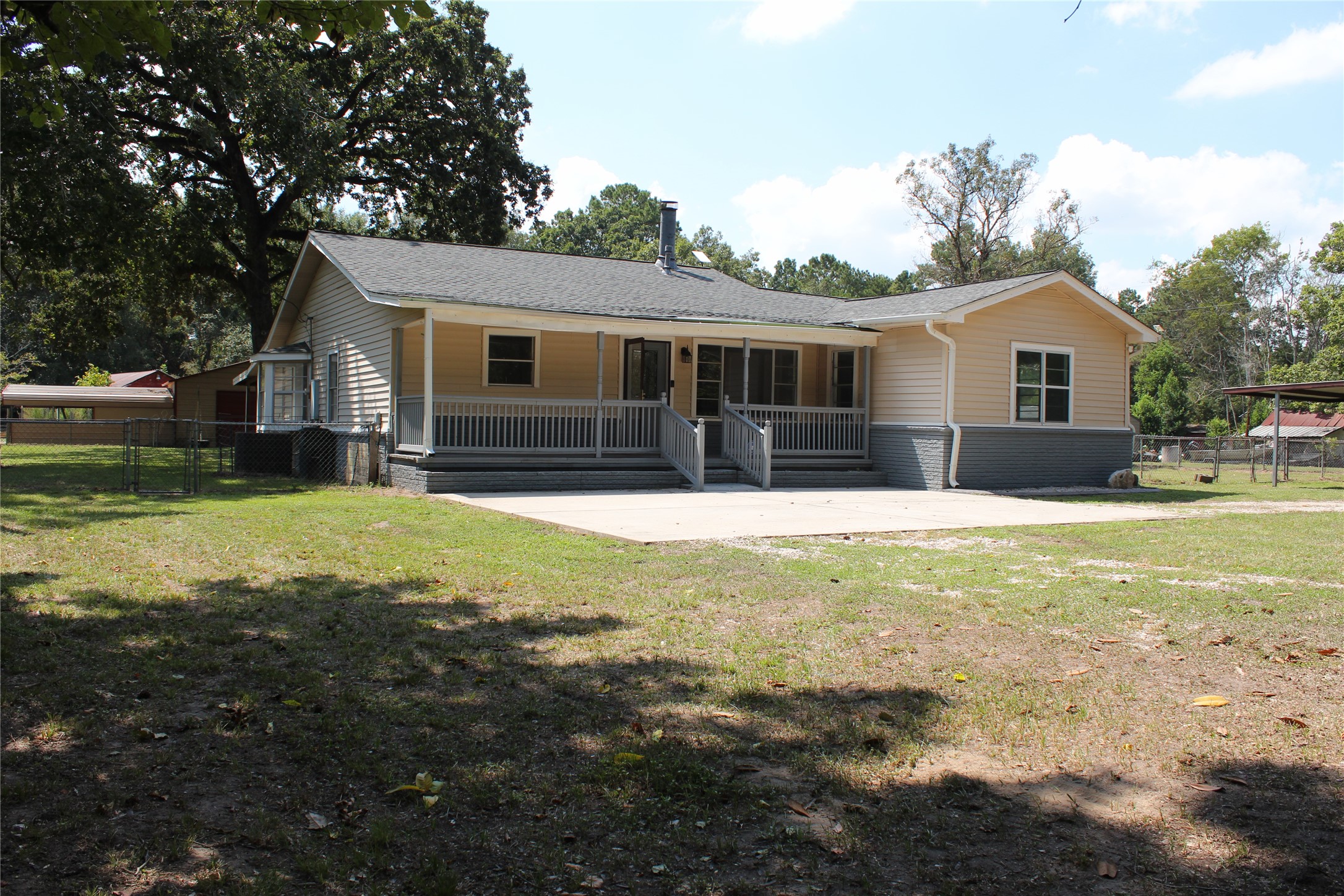 14040 FM 1484 Road Conroe, TX 77303 - Photo 1 of 47 a house view with a outdoor space