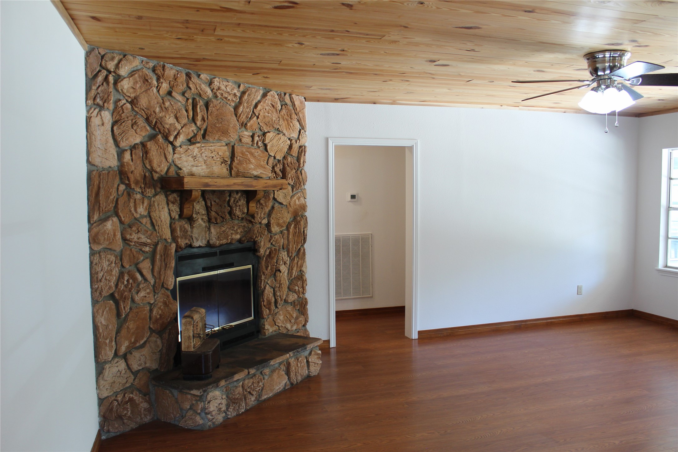 14040 FM 1484 Road Conroe, TX 77303 - Photo 15 of 47 a living room with a fireplace