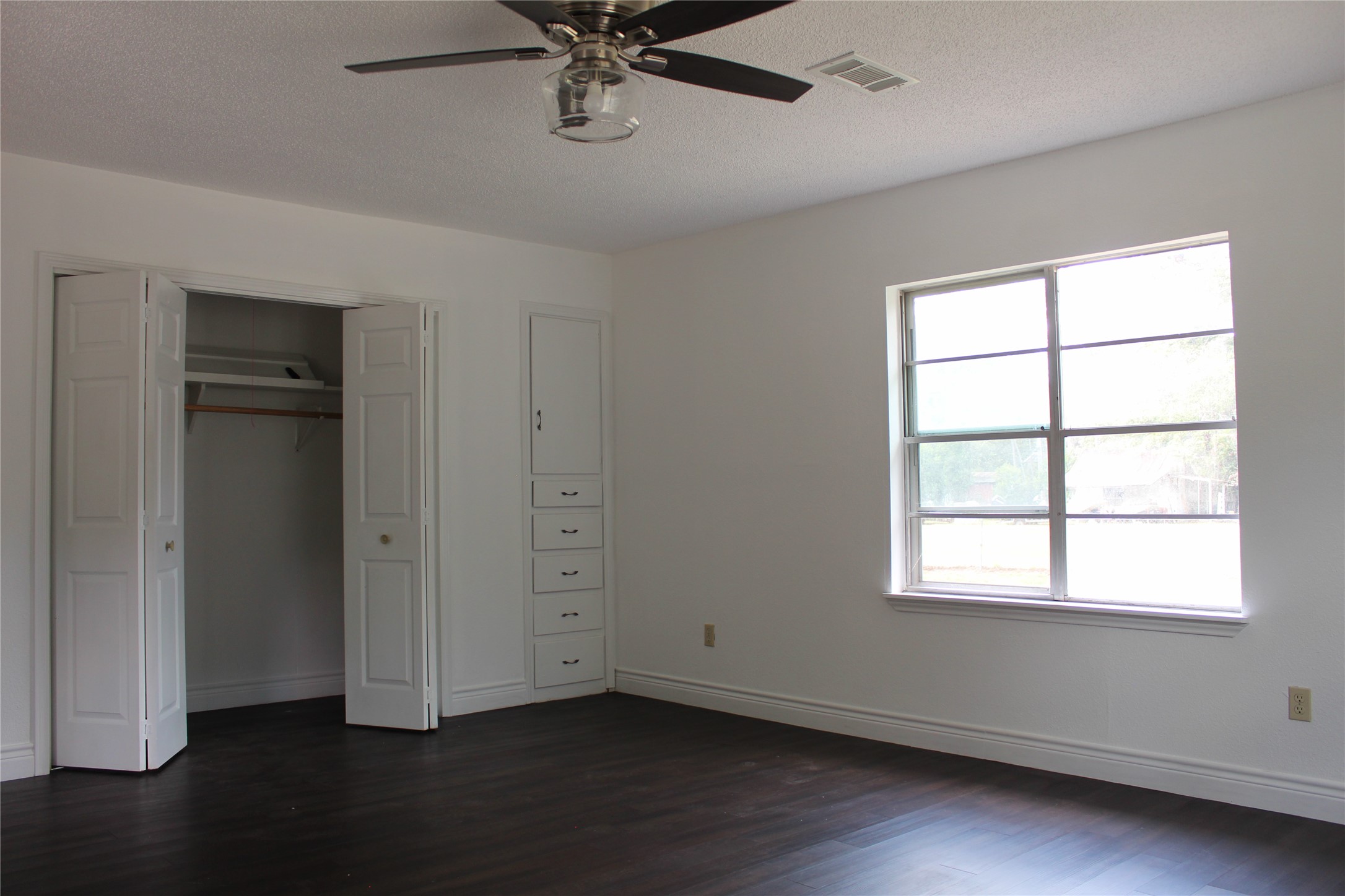 14040 FM 1484 Road Conroe, TX 77303 - Photo 20 of 47 a view of an empty room with a window