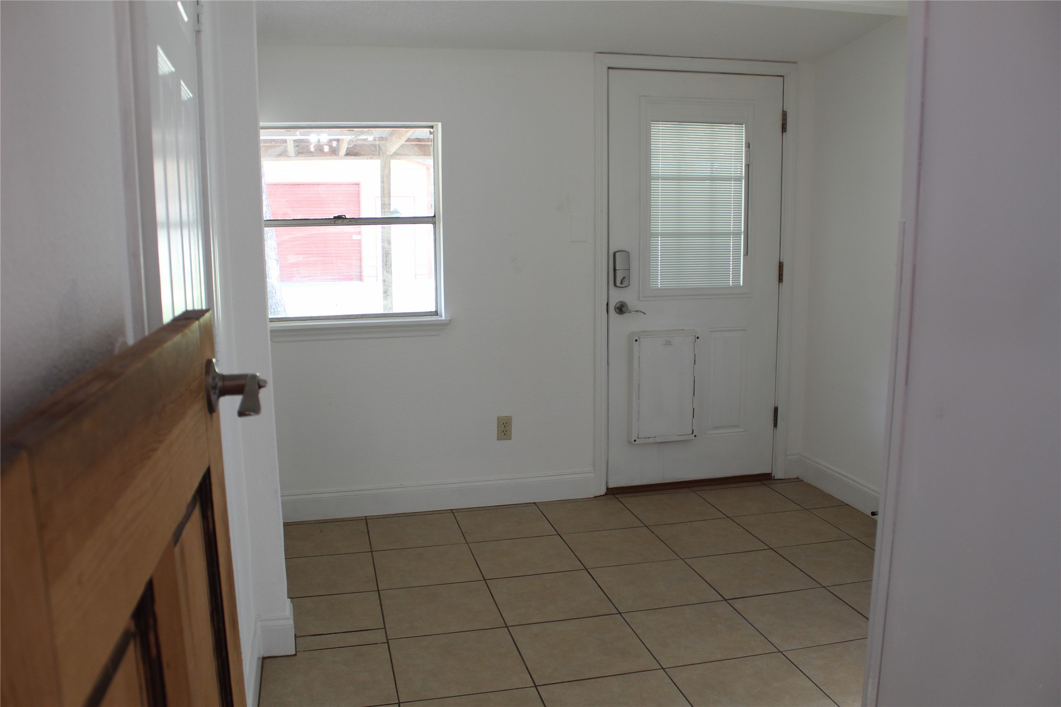 14040 FM 1484 Road Conroe, TX 77303 - Photo 22 of 47 a view of an empty room with a window