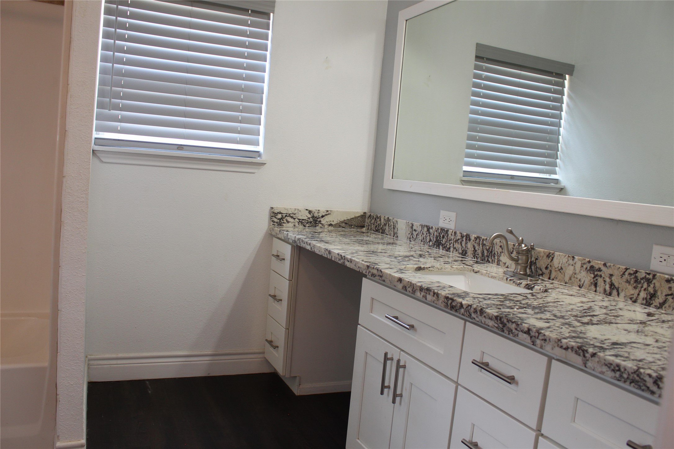 14040 FM 1484 Road Conroe, TX 77303 - Photo 24 of 47 a bathroom with a sink and a window