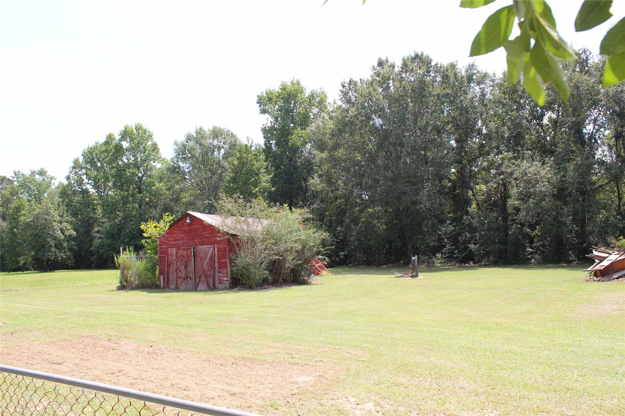 14040 FM 1484 Road Conroe, TX 77303 - Photo 36 of 47 a view of a house with a yard