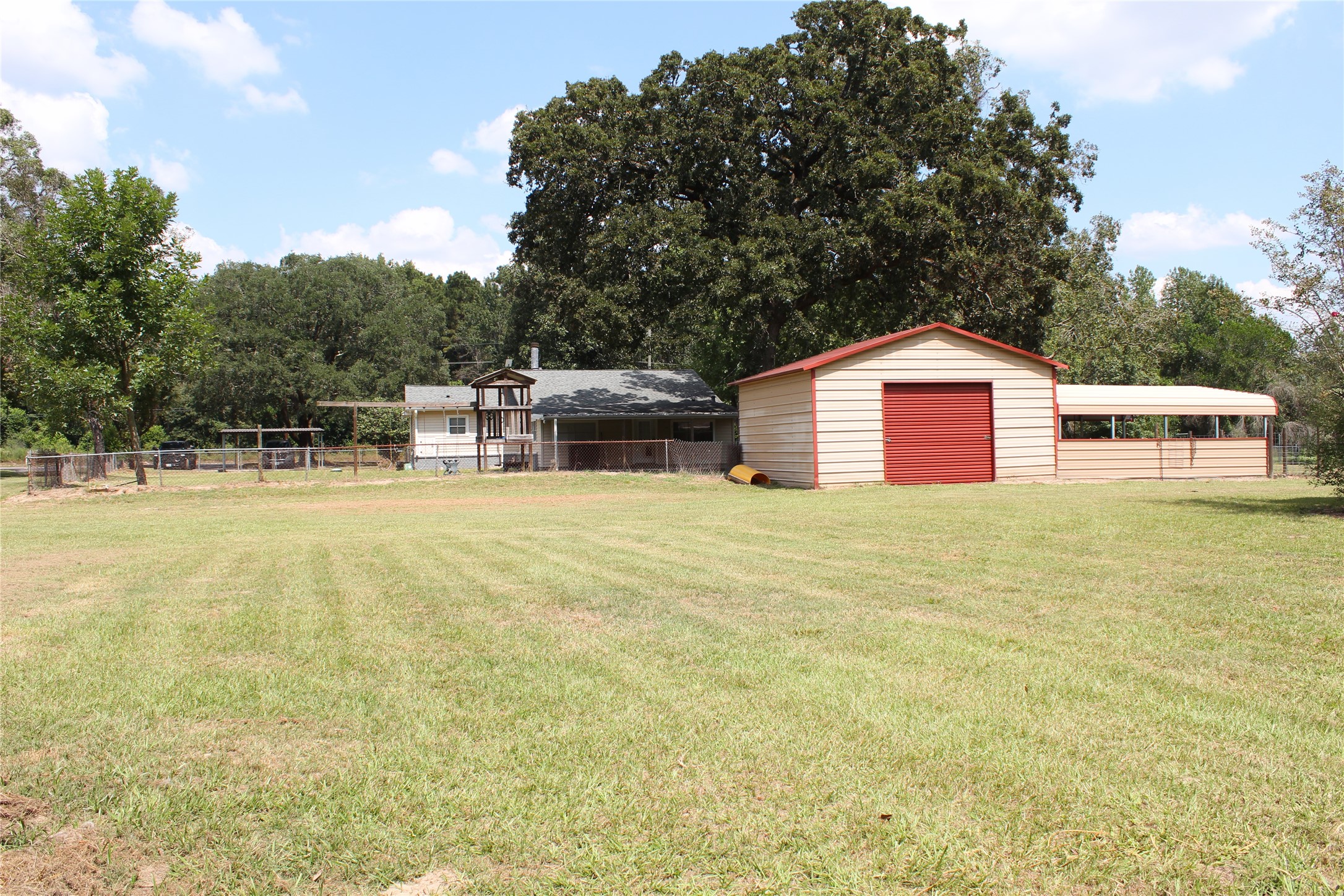 14040 FM 1484 Road Conroe, TX 77303 - Photo 38 of 47 a front view of a house with a yard