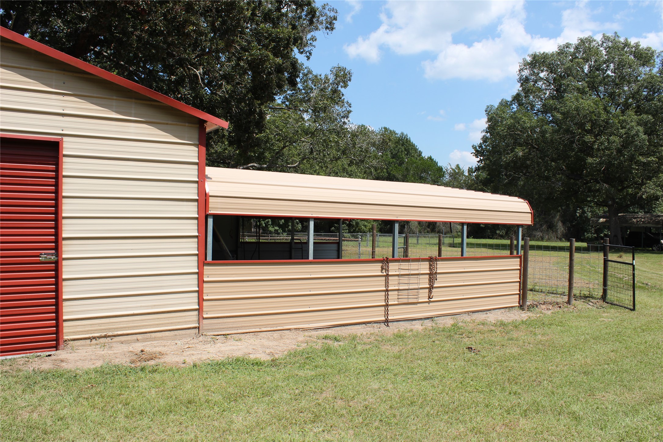 14040 FM 1484 Road Conroe, TX 77303 - Photo 42 of 47 a view of a white house with a yard