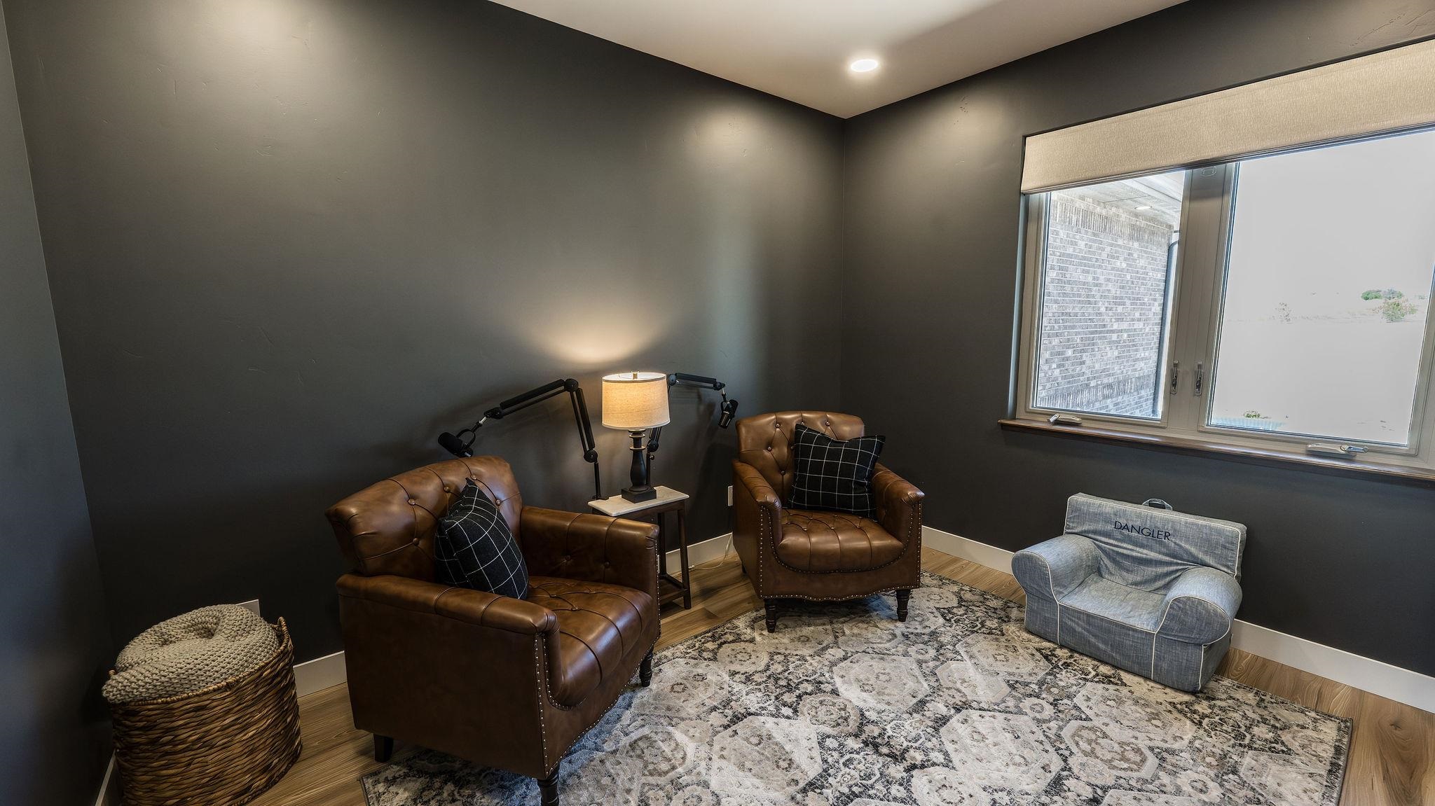 2639 Emerald Ridge Lane Grand Junction, CO 81506 - Photo 31 of 42 a living room with furniture and a window