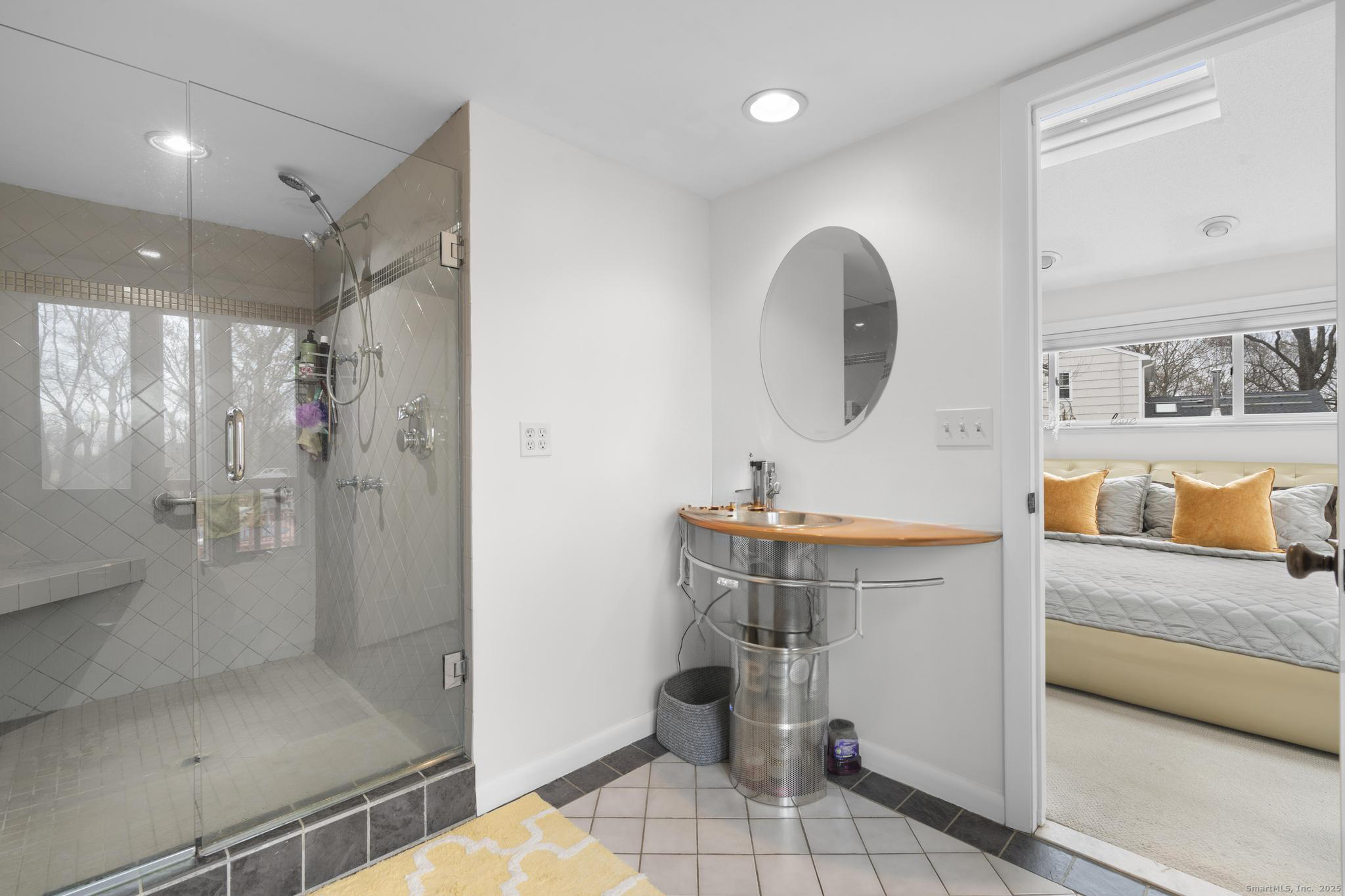 57 Gray Rock Road Trumbull, CT 06611 - Photo 15 of 40 a bathroom with a sink a toilet and shower