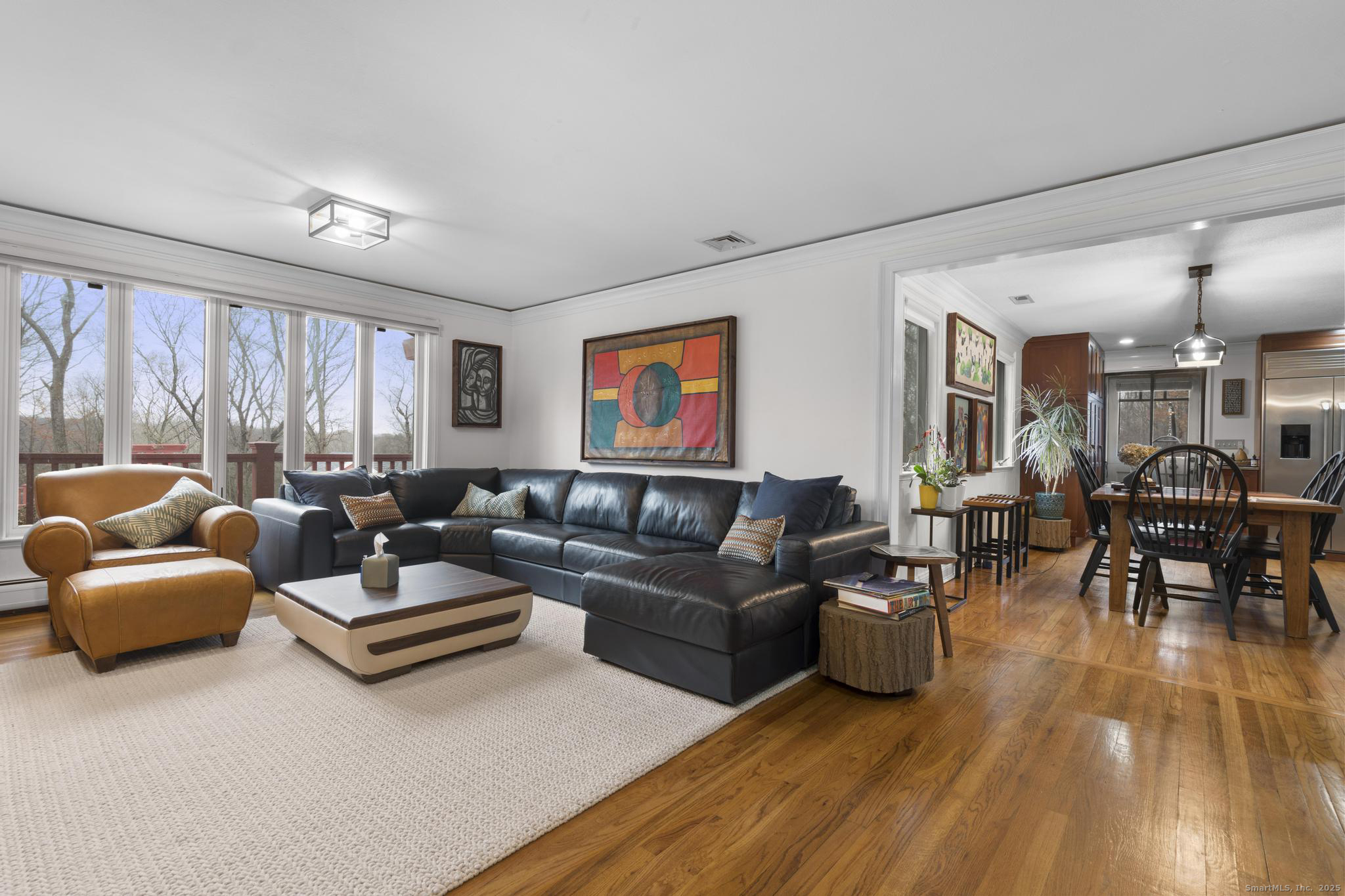 57 Gray Rock Road Trumbull, CT 06611 - Photo 16 of 40 a living room with furniture and a wooden floor