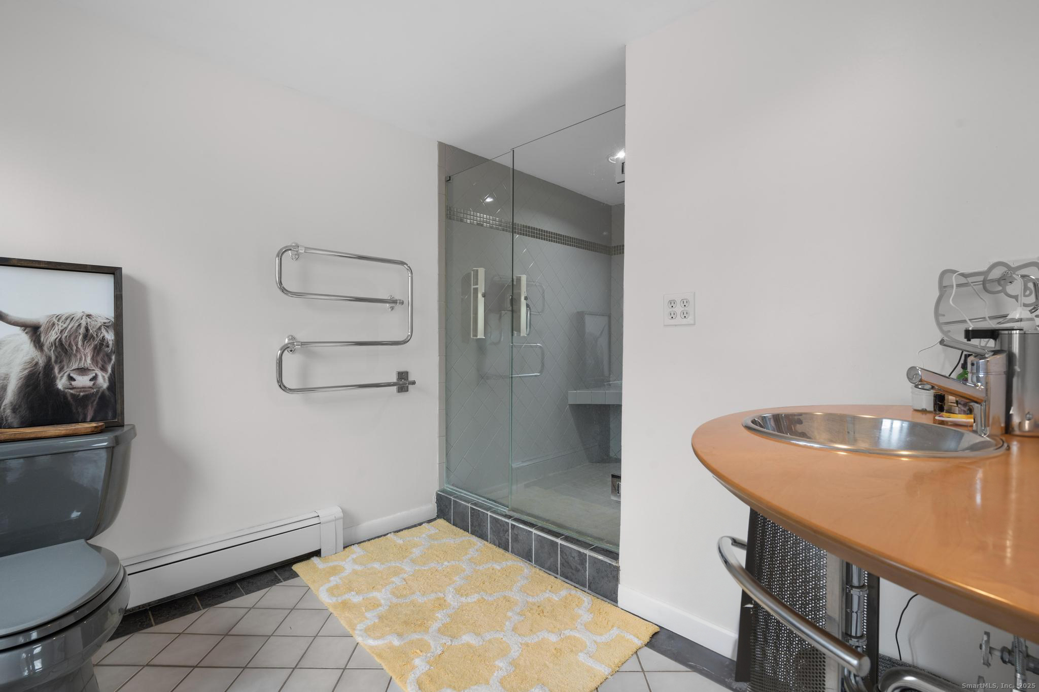 57 Gray Rock Road Trumbull, CT 06611 - Photo 20 of 40 a bathroom with a sink a toilet and shower