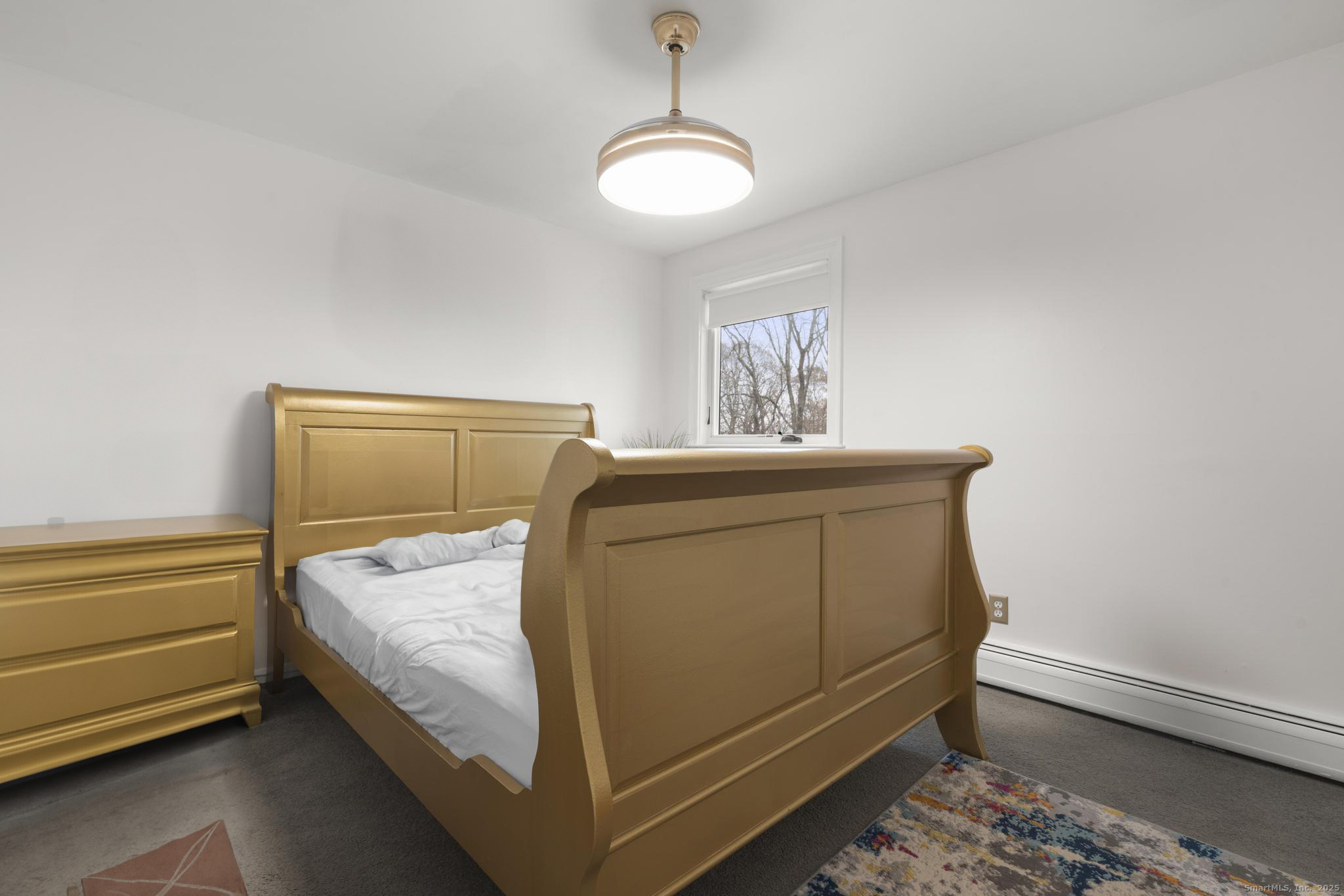 57 Gray Rock Road Trumbull, CT 06611 - Photo 25 of 40 a bedroom with a bed and a window