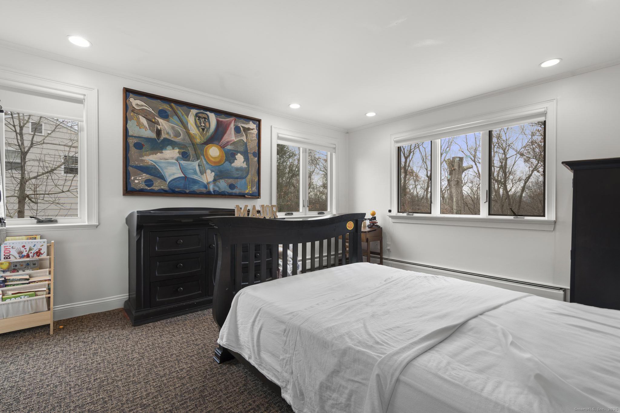 57 Gray Rock Road Trumbull, CT 06611 - Photo 26 of 40 a bedroom with a bed and a painting on the wall