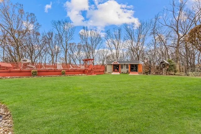 a view of a house with a big yard