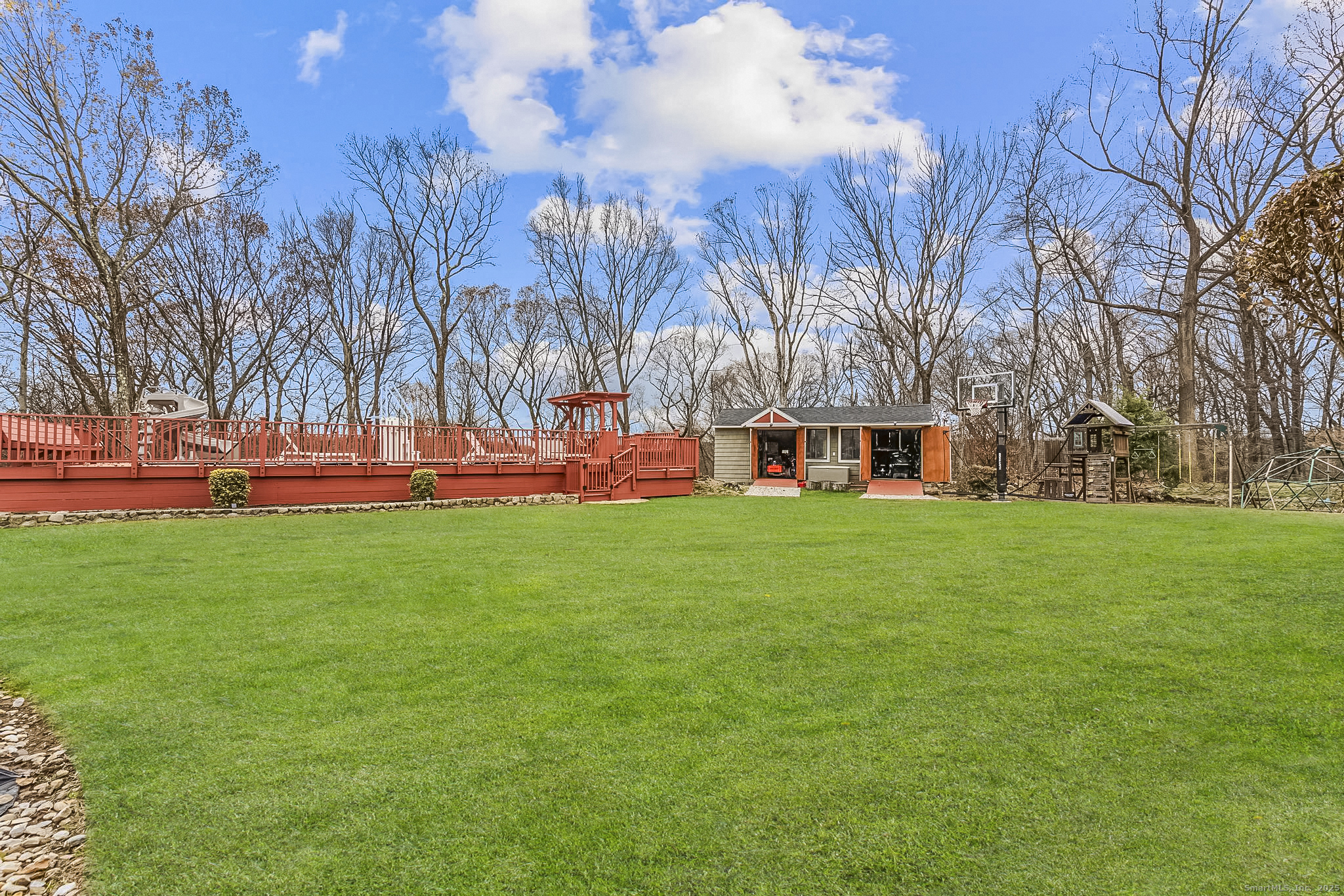 57 Gray Rock Road Trumbull, CT 06611 - Photo 40 of 40 a view of a house with a big yard