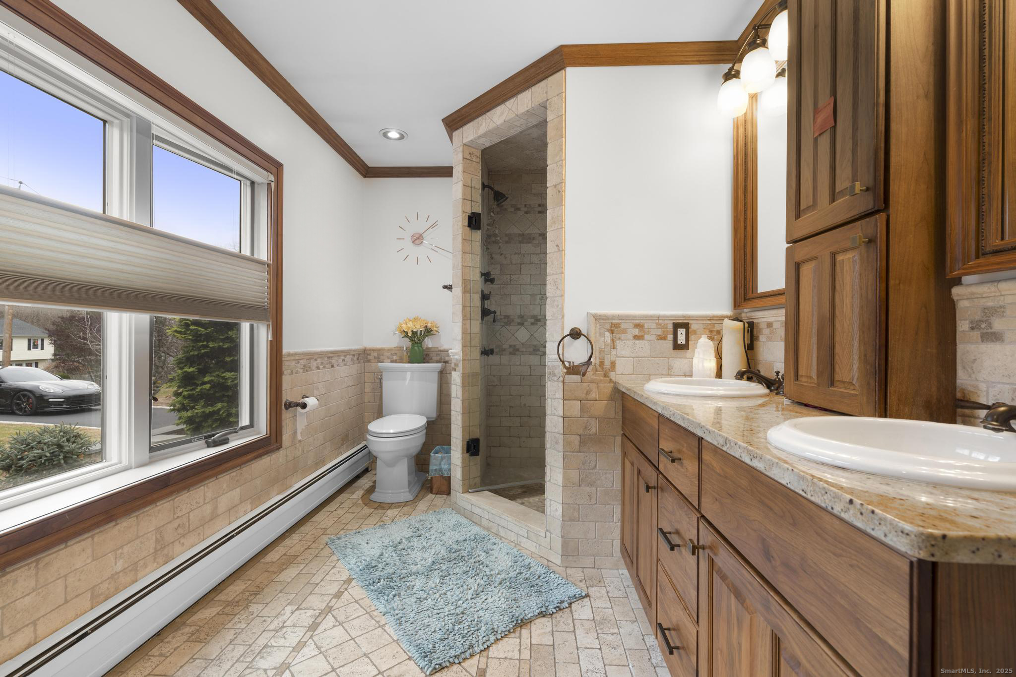 57 Gray Rock Road Trumbull, CT 06611 - Photo 9 of 40 a bathroom with a granite countertop sink and a mirror