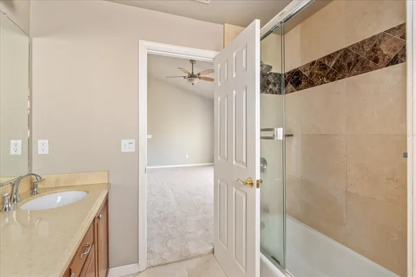 a bathroom with a sink and a shower