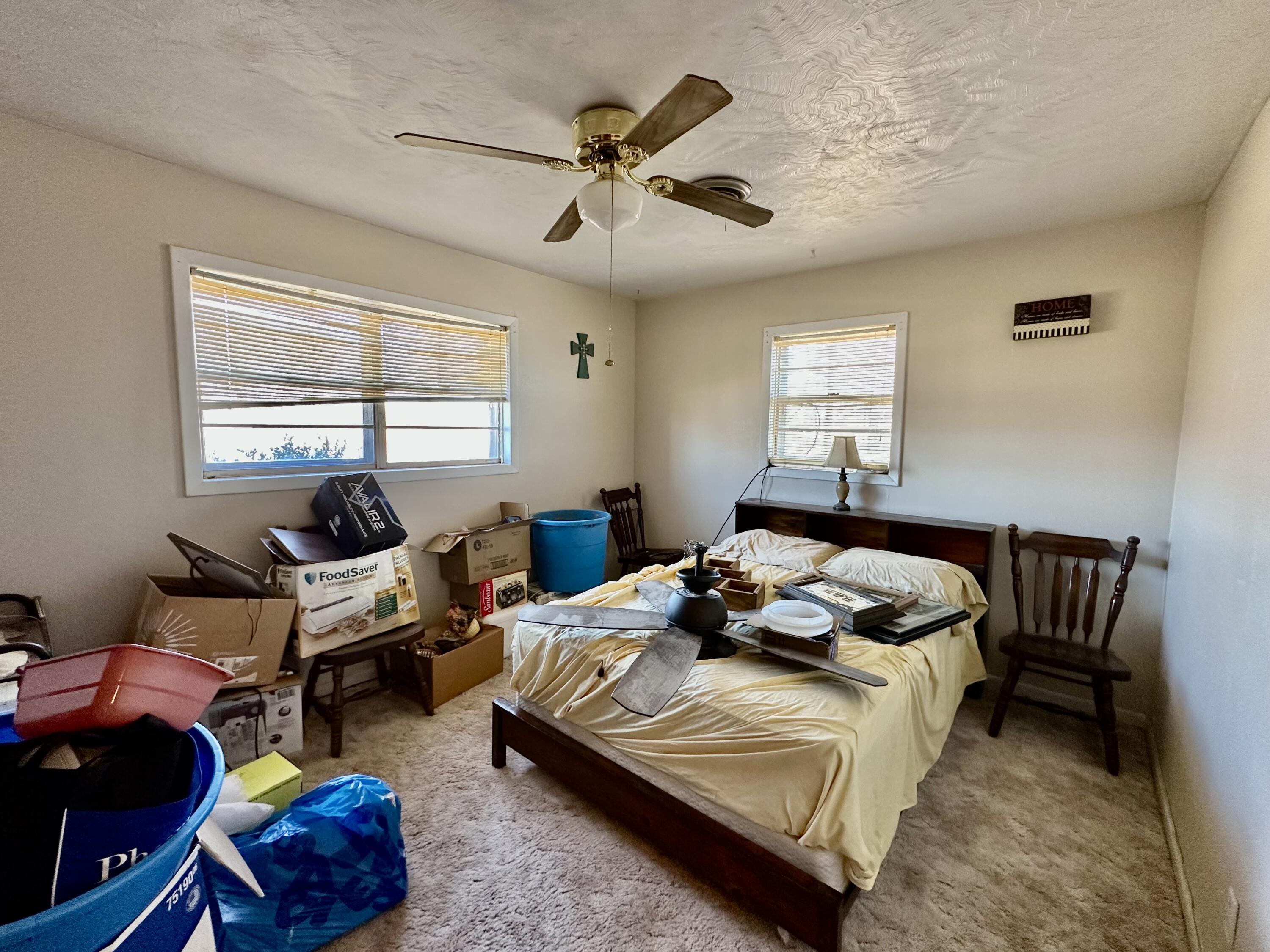 488 Co Road 4 Turkey, TX 79261 - Photo 13 of 29 a bedroom with furniture and a window