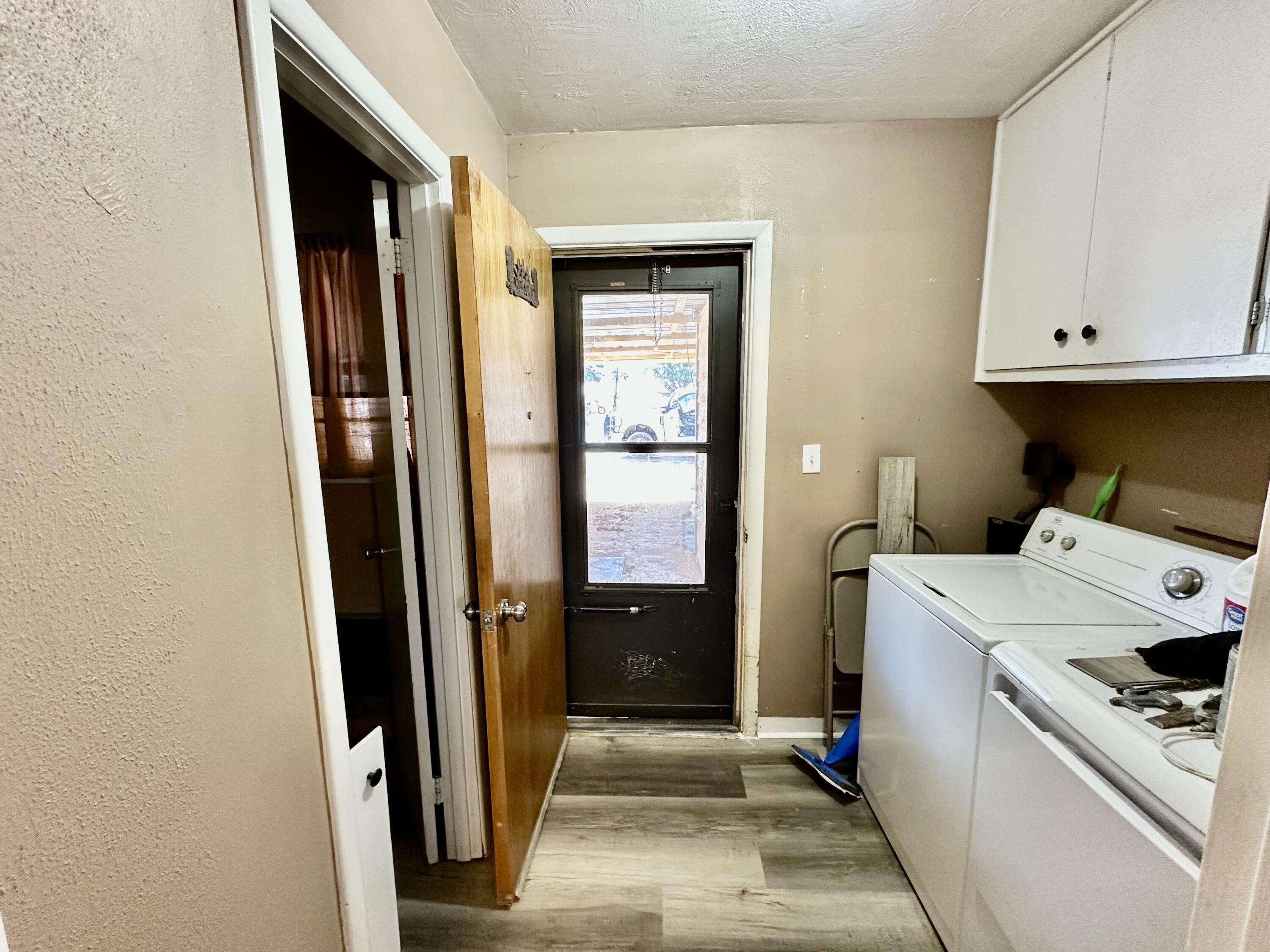 488 Co Road 4 Turkey, TX 79261 - Photo 20 of 29 a room with storage and utility