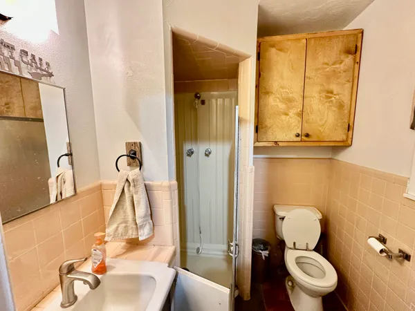 a view of a backyard of the house