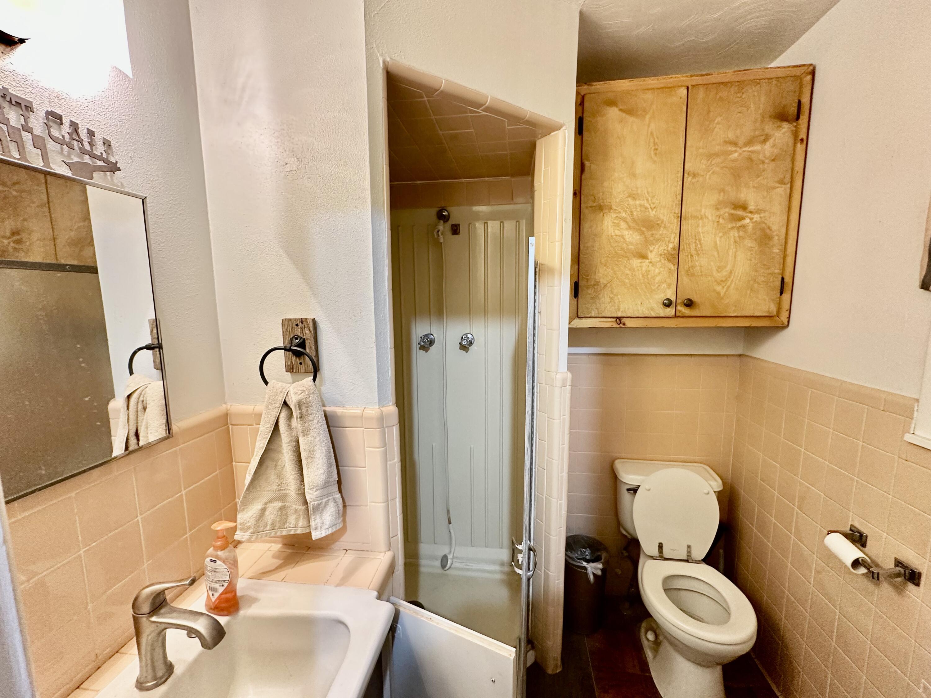 488 Co Road 4 Turkey, TX 79261 - Photo 21 of 29 a bathroom with a toilet and a sink