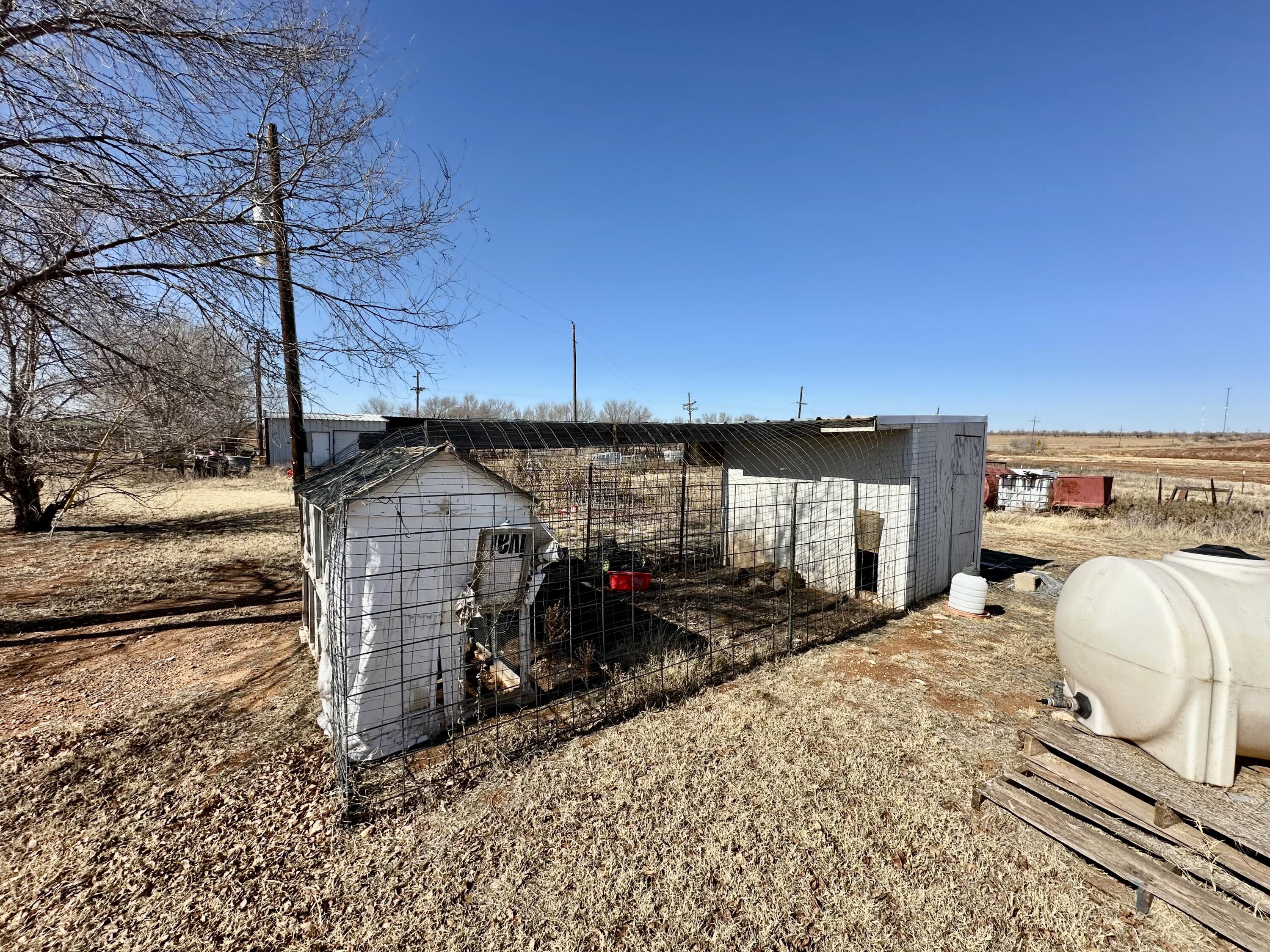 488 Co Road 4 Turkey, TX 79261 - Photo 27 of 29 a view of a car park in front of house