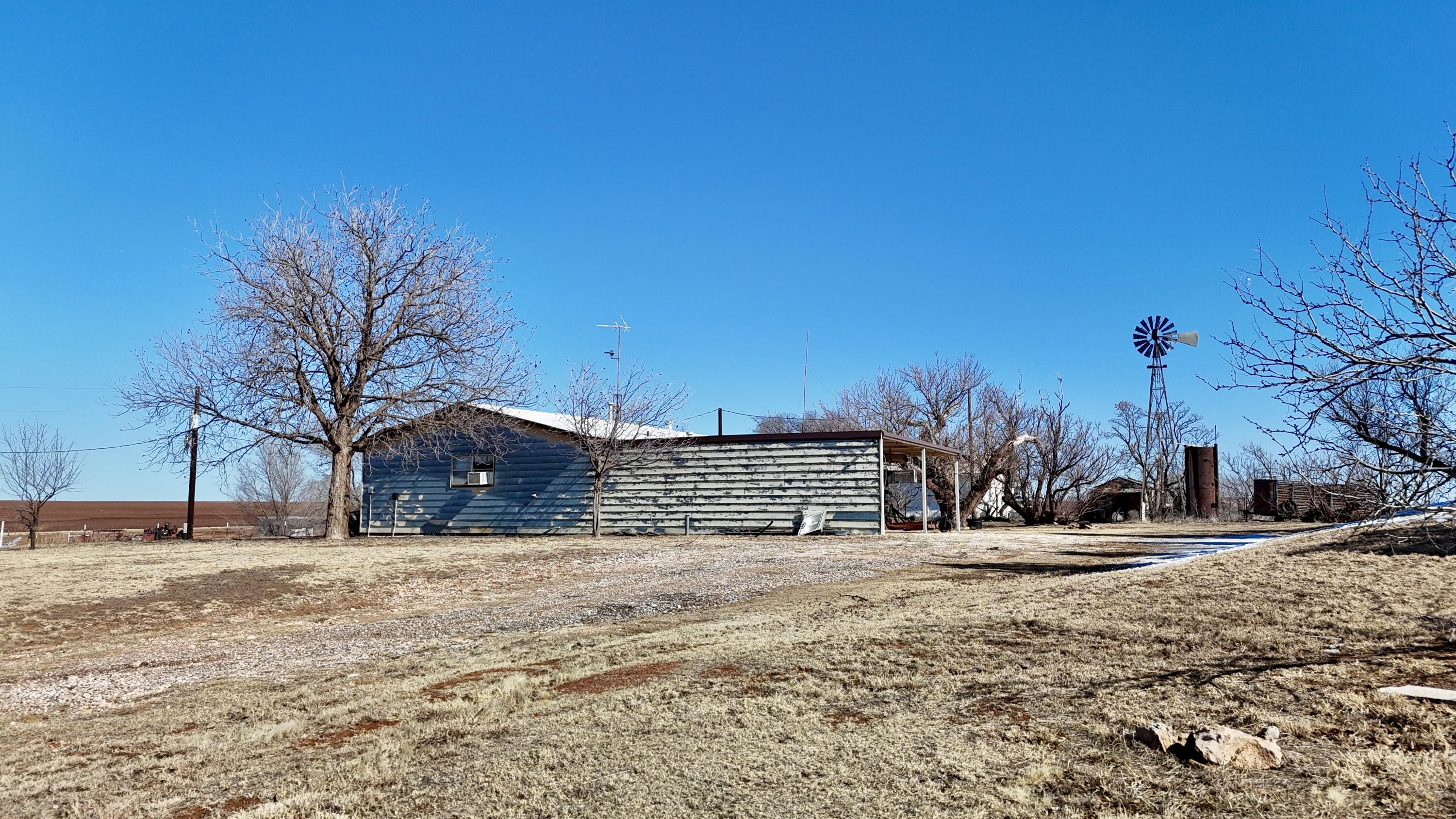 488 Co Road 4 Turkey, TX 79261 - Photo 4 of 29 a view of outdoor space with deck and tree