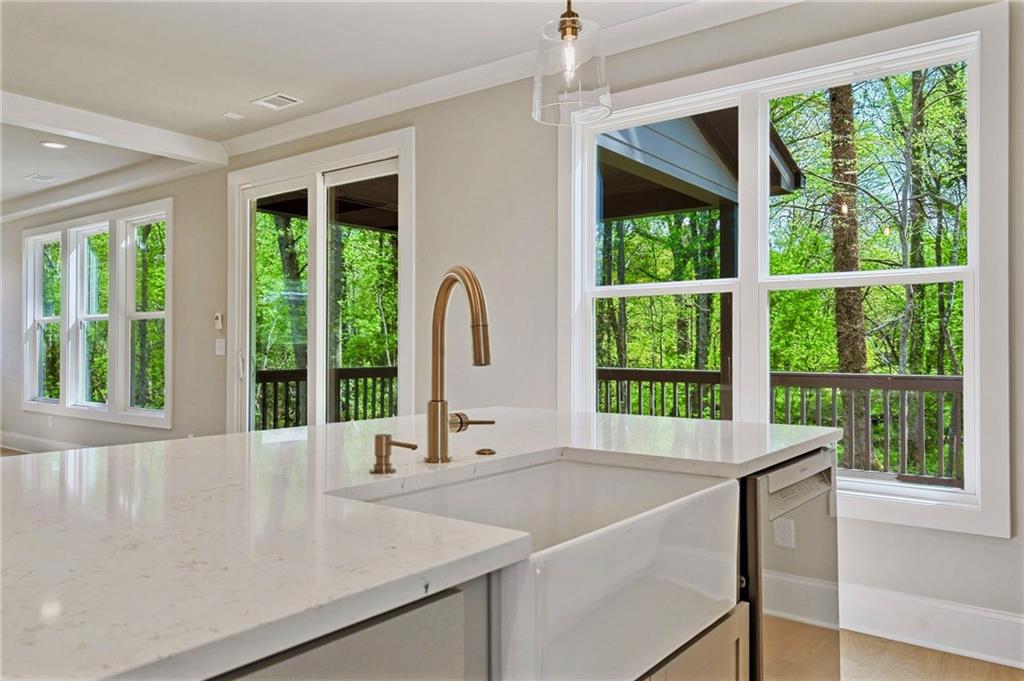 1697 Eastside Parc Street Atlanta, GA 30316 - Photo 17 of 44 a view of a kitchen with a sink and a large window