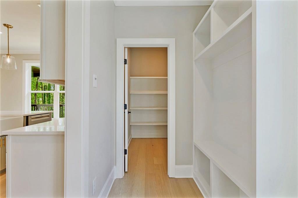 1697 Eastside Parc Street Atlanta, GA 30316 - Photo 21 of 44 a view of a bedroom with a wardrobe space