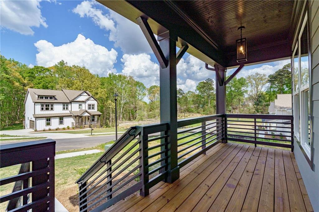 1697 Eastside Parc Street Atlanta, GA 30316 - Photo 3 of 44 a view of a balcony with wooden floor