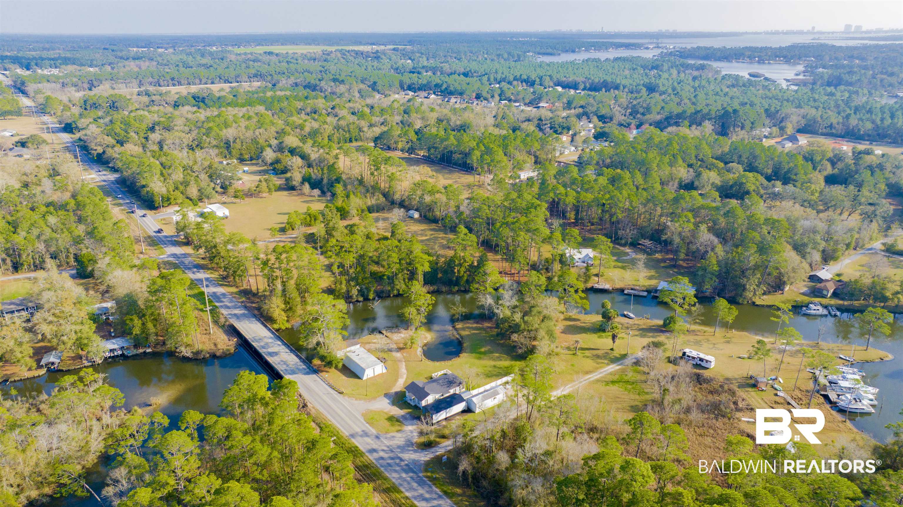 23770 Miflin Road Elberta, AL 36530 - Photo 33 of 38 Aerial view of property and surrounding area featuring a nearby body of water