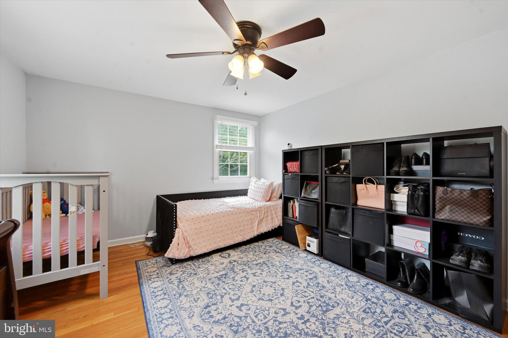 3 South Dillwyn Road Newark, DE 19711 - Photo 21 of 59 a bedroom with bed and a book shelf