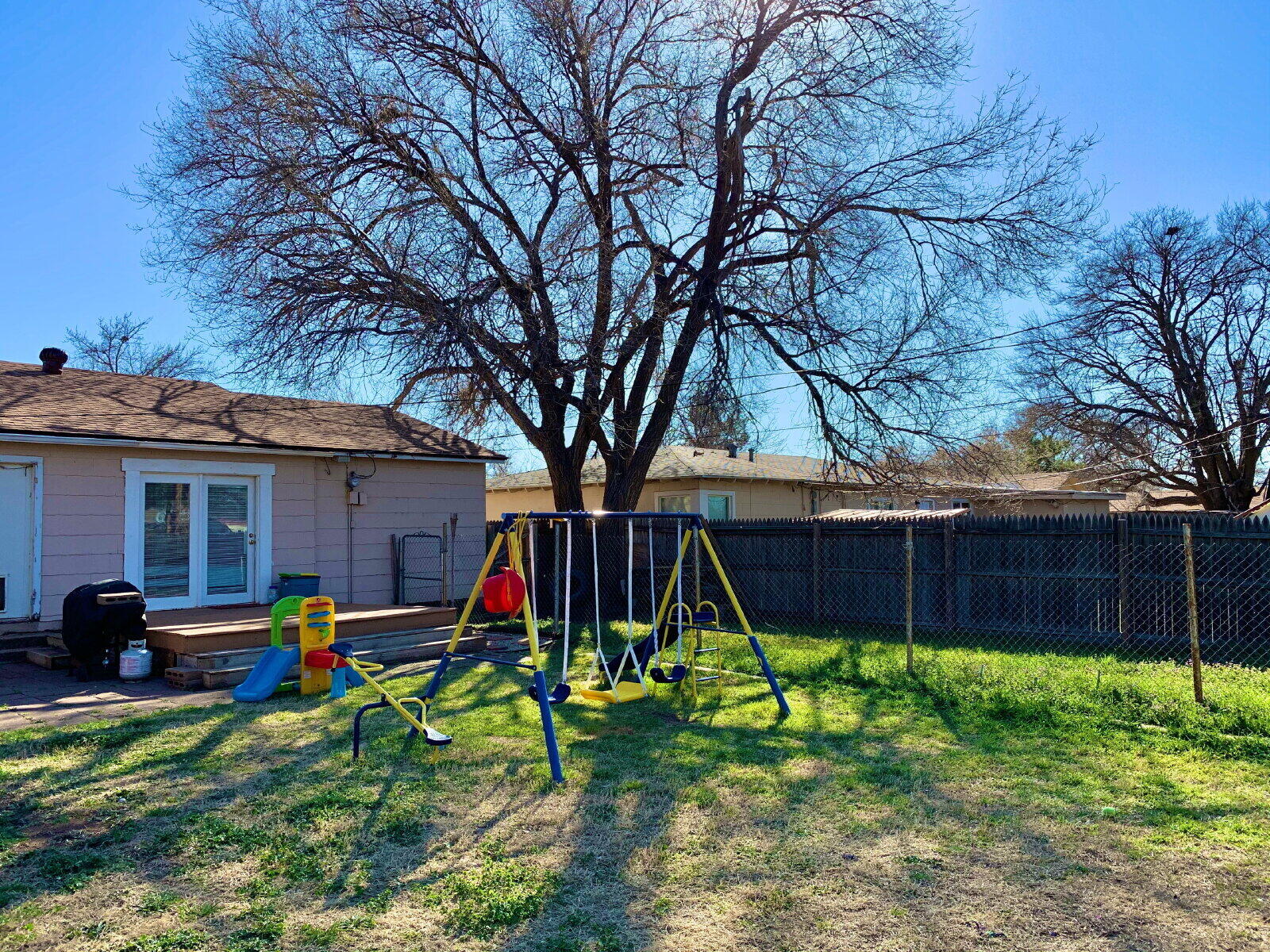 4206 45th Street Lubbock, TX 79413 - Photo 14 of 14 a view of backyard with a table and chairs
