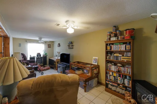 a view of a workspace with furniture and toys