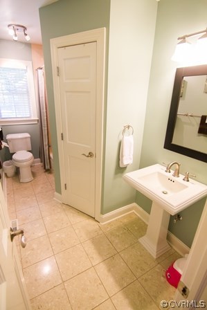 14000 Hensley Road Midlothian, VA 23112 - Photo 10 of 24 a bathroom with a sink toilet and shower