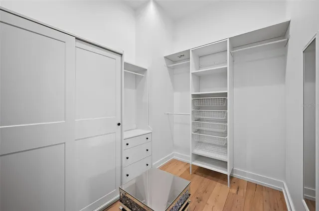 a view of an empty walk in closet