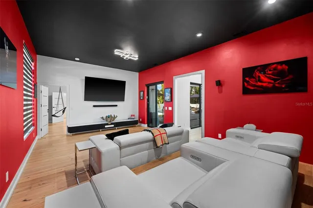 a living room with a wooden floor