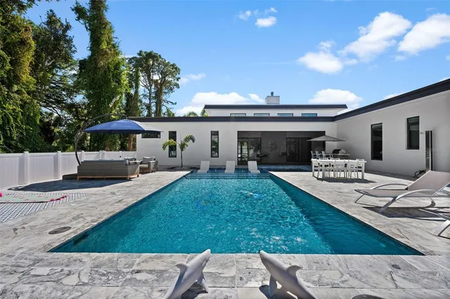 a view of an outdoor space and swimming pool