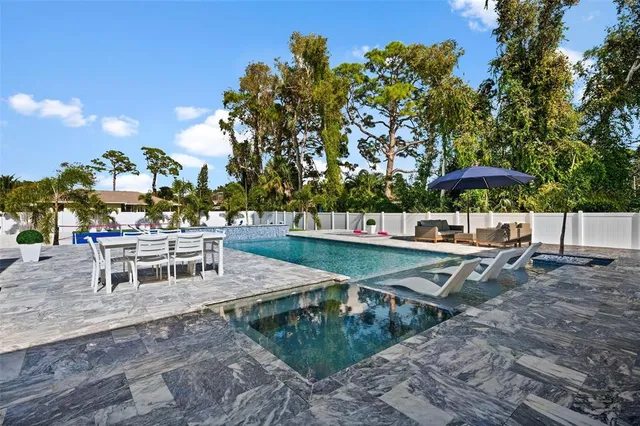 an aerial view of residential building with parking space