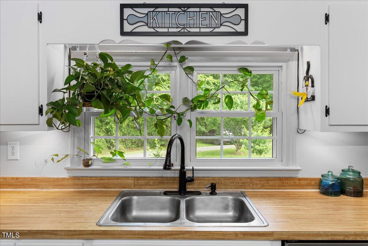 3151 Brogden Road Stem, NC 27581 - Photo 11 of 58 a kitchen sink with a window