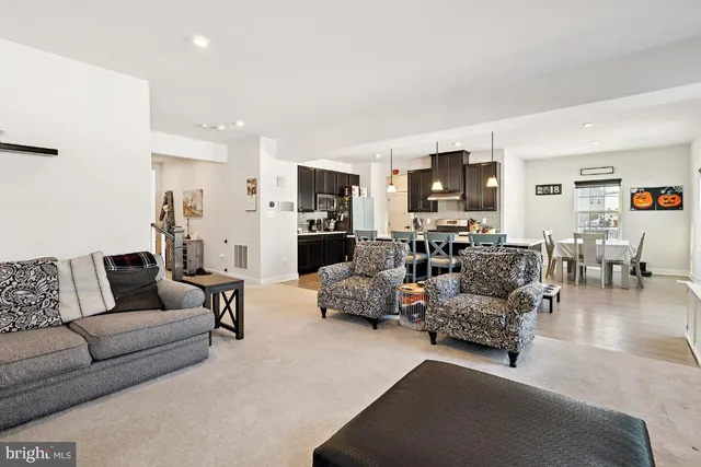 a living room with furniture and a couch