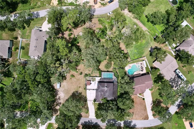 a living room with furniture fireplace and flat screen tv