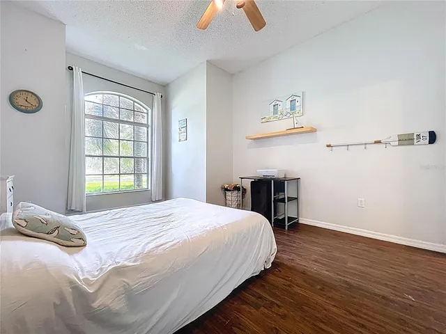 a view of a livingroom with furniture and windows