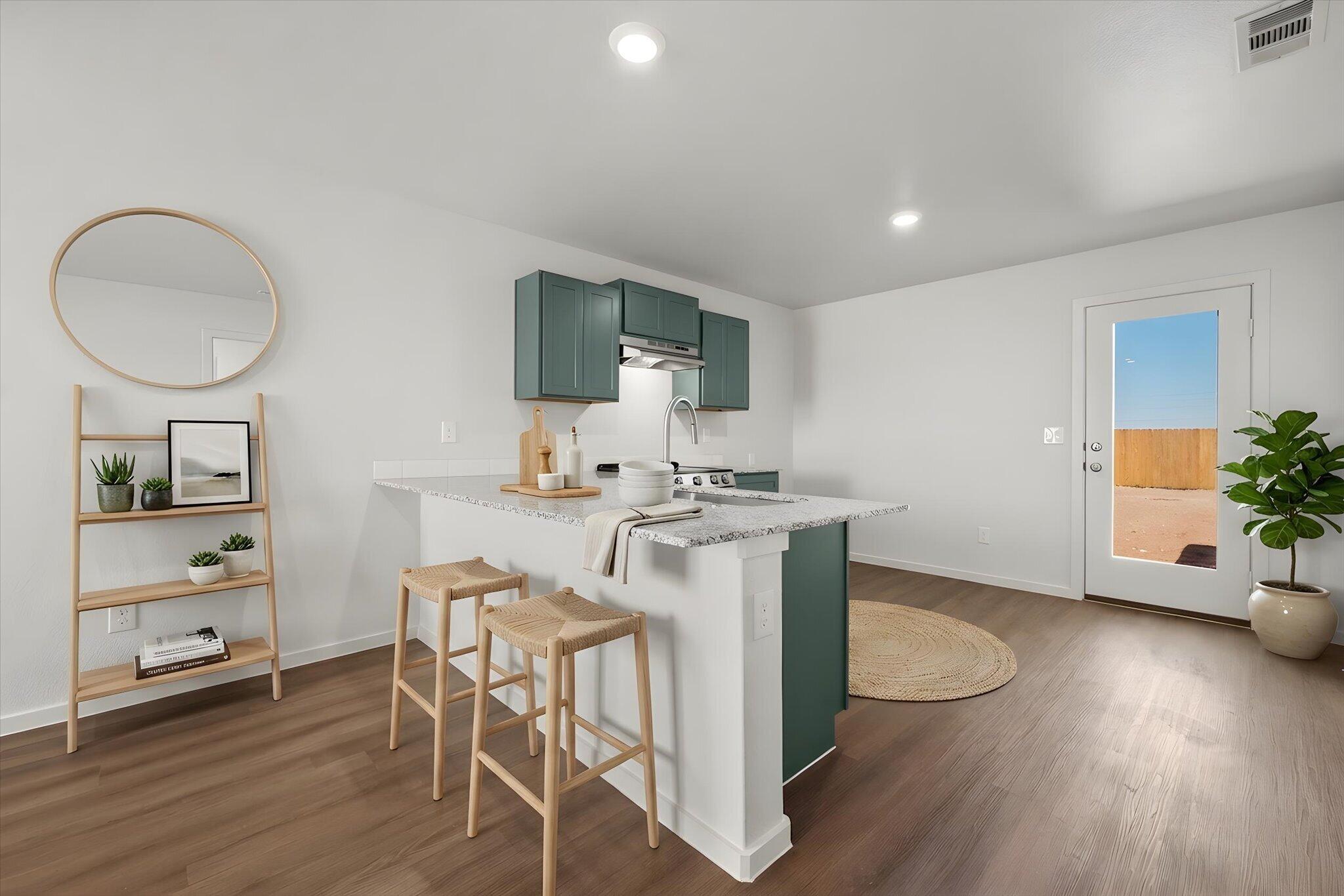 5518 Smith Street Lubbock, TX 79416 - Photo 10 of 22 a kitchen with a table and chairs in it