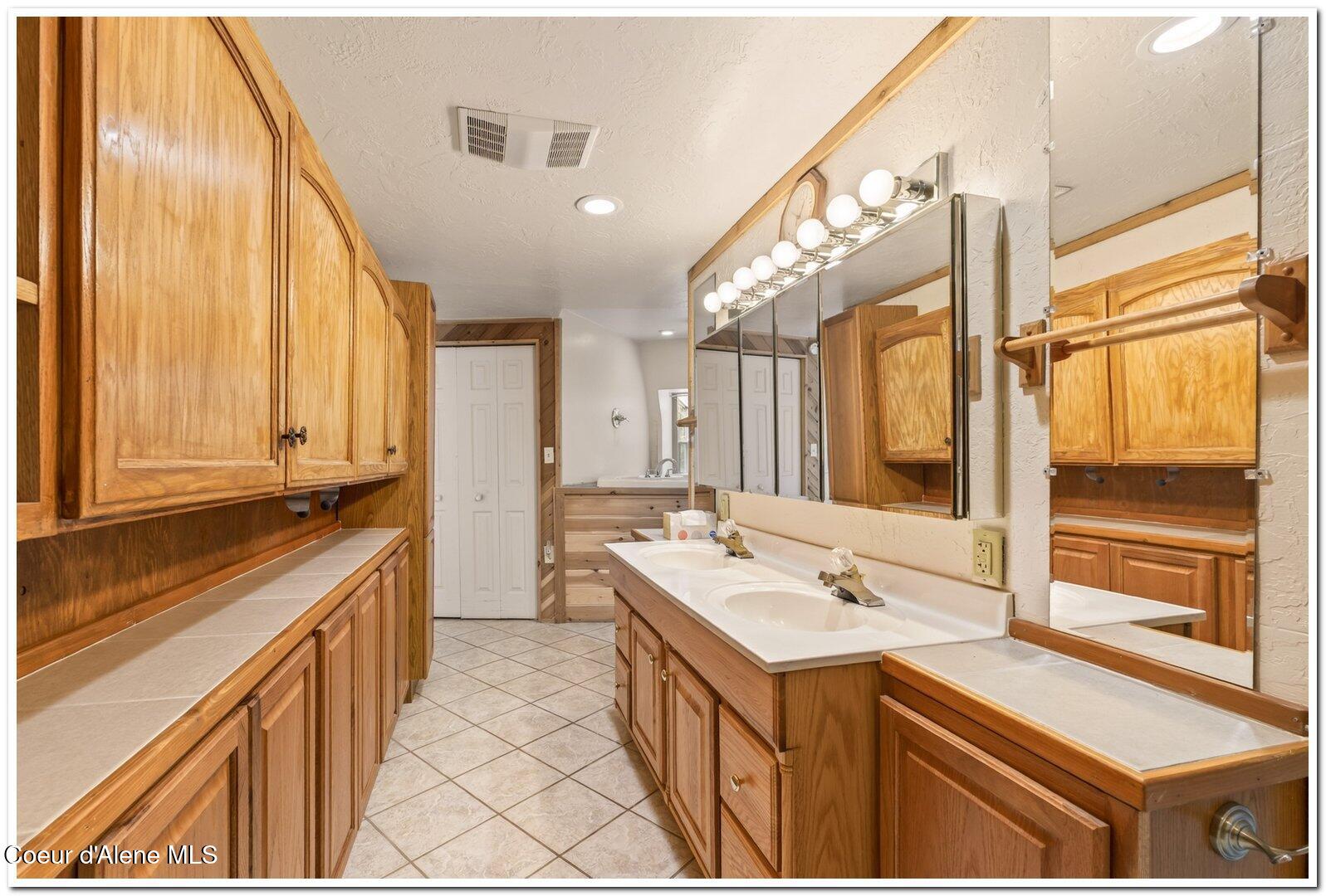 159 Tower Road Naples, ID 83847 - Photo 16 of 50 17 Primary Bathroom with Wall of Storage