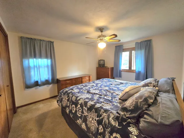 a livingroom with furniture and a window