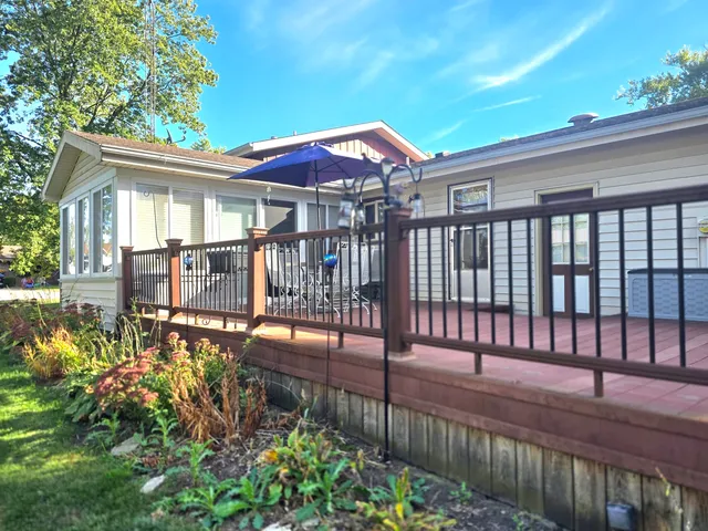 a view of a swimming pool with a patio